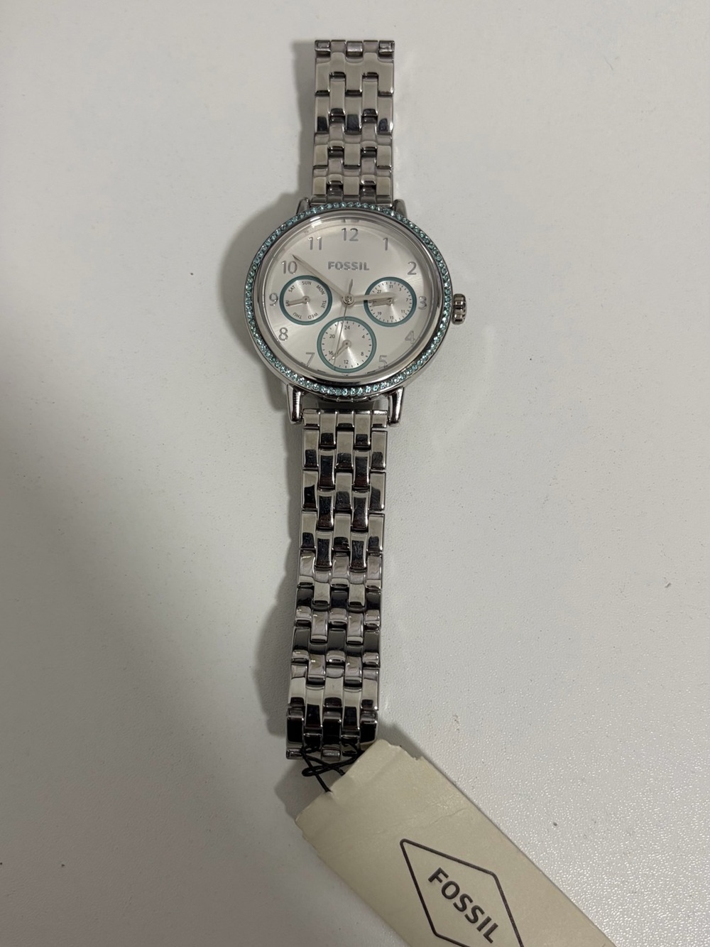 Fossil Silver Watch with Light Blue Accents and Crystal Bezel